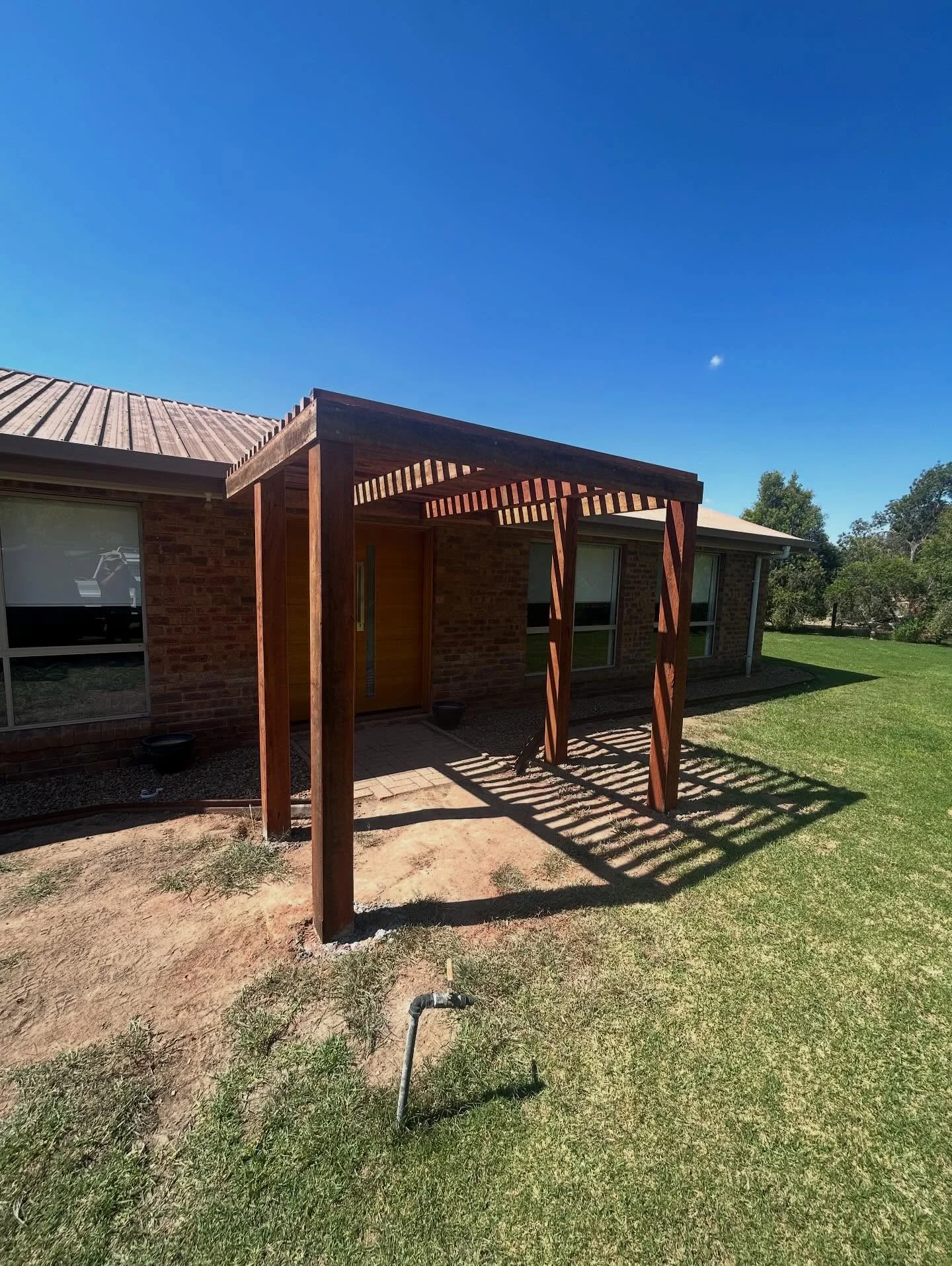 C & C Build Co’s finished timber entry pergola