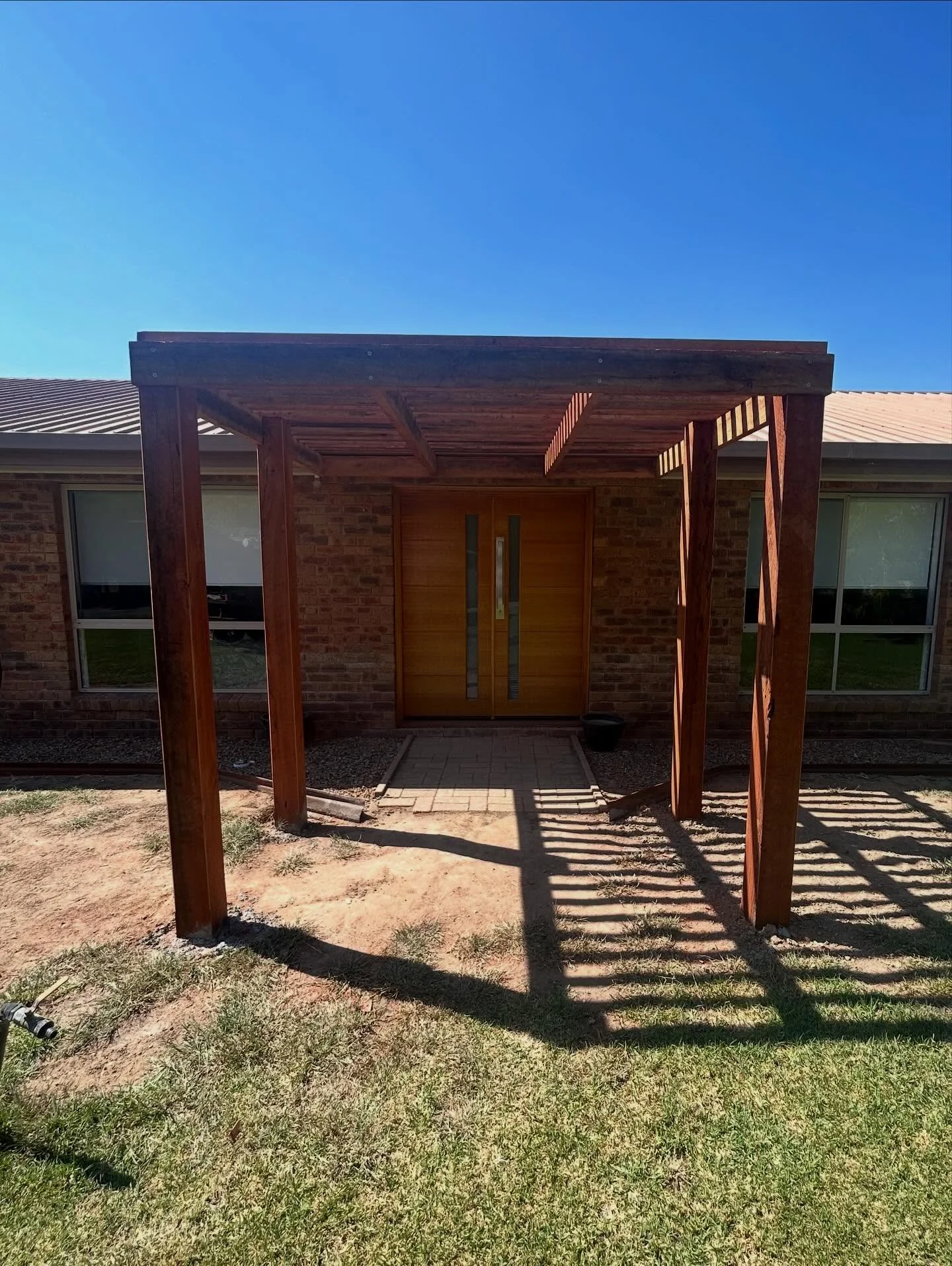 Finished Ironbark entry pergola by C & C Build Co